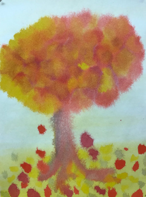 Wet-on-wet watercolour painting of an autumn tree in red, orange, and yellow